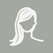 A minimalist, grey avatar icon of a woman with long hair, perfect for representing a hair salon. The design includes basic features like hair, neck, and shoulders on a plain grey background. The facial features are not detailed, making it versatile for various uses.