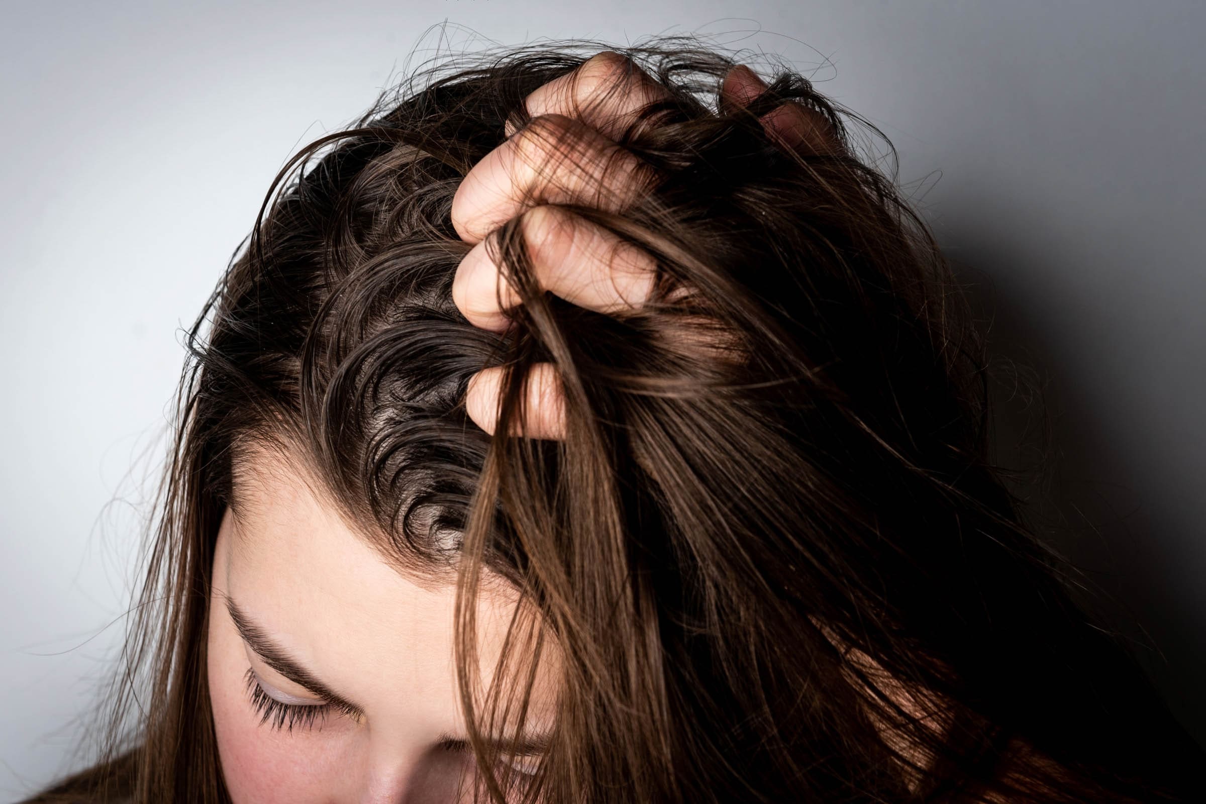 What Causes Oily Hair and How to Fix It