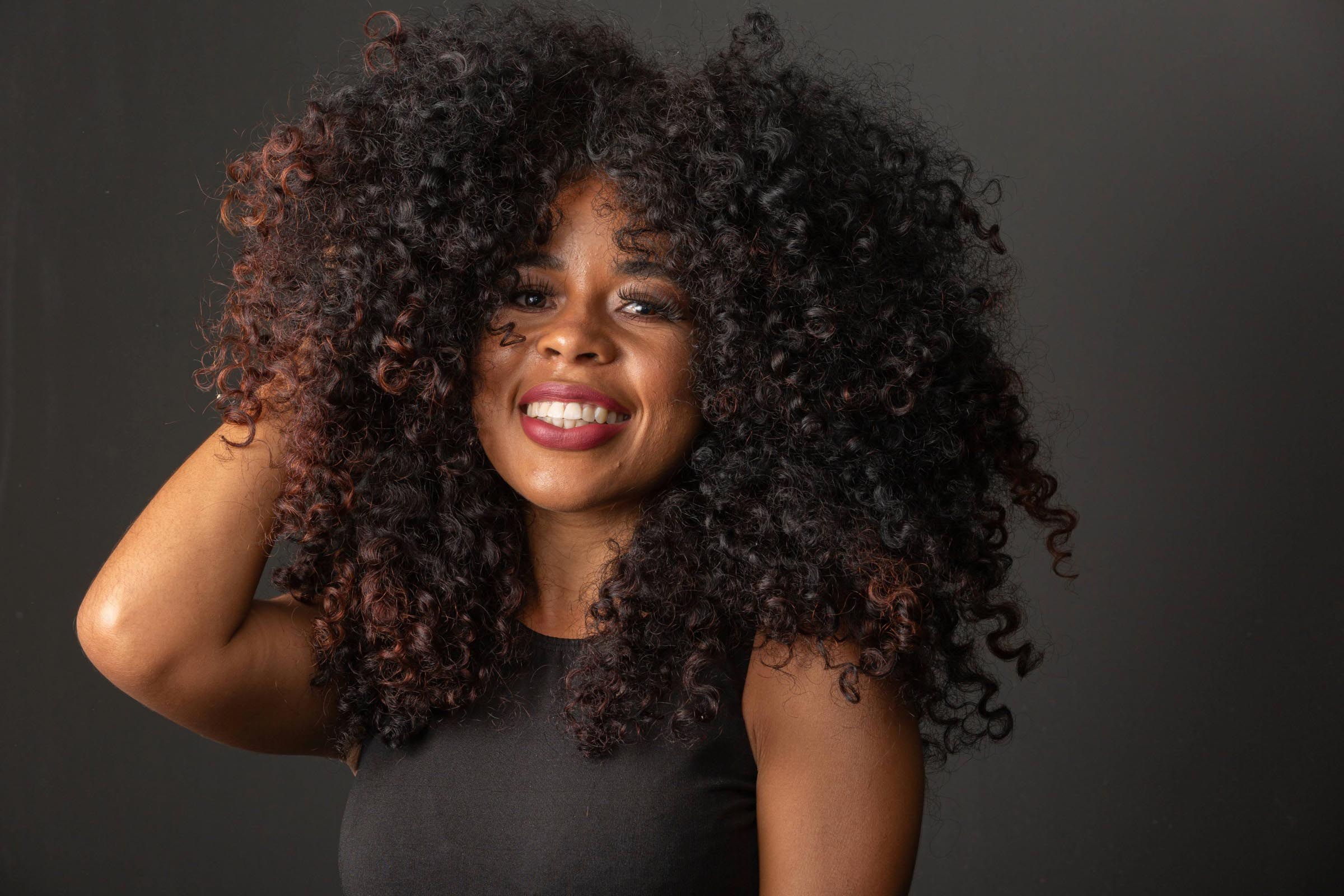 Taming Your Curls: Tips from a Curly Hair Stylist